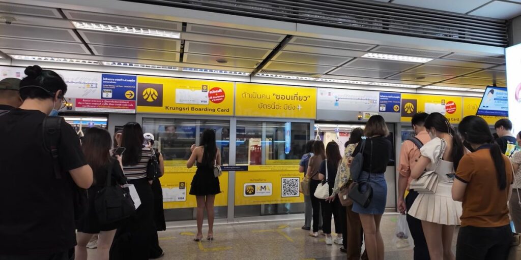 people wait in line Bangkok MRT