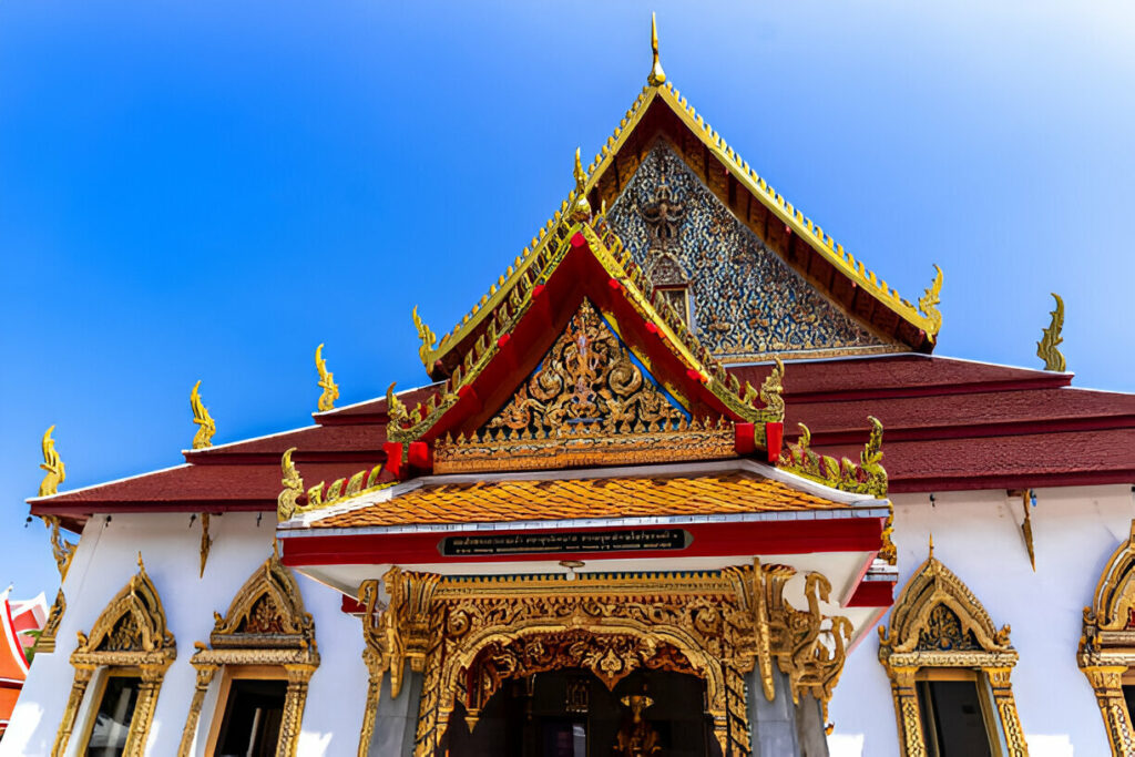 Wat Chana Songkram Bangkok, a historic temple with a beautiful red and gold roof.